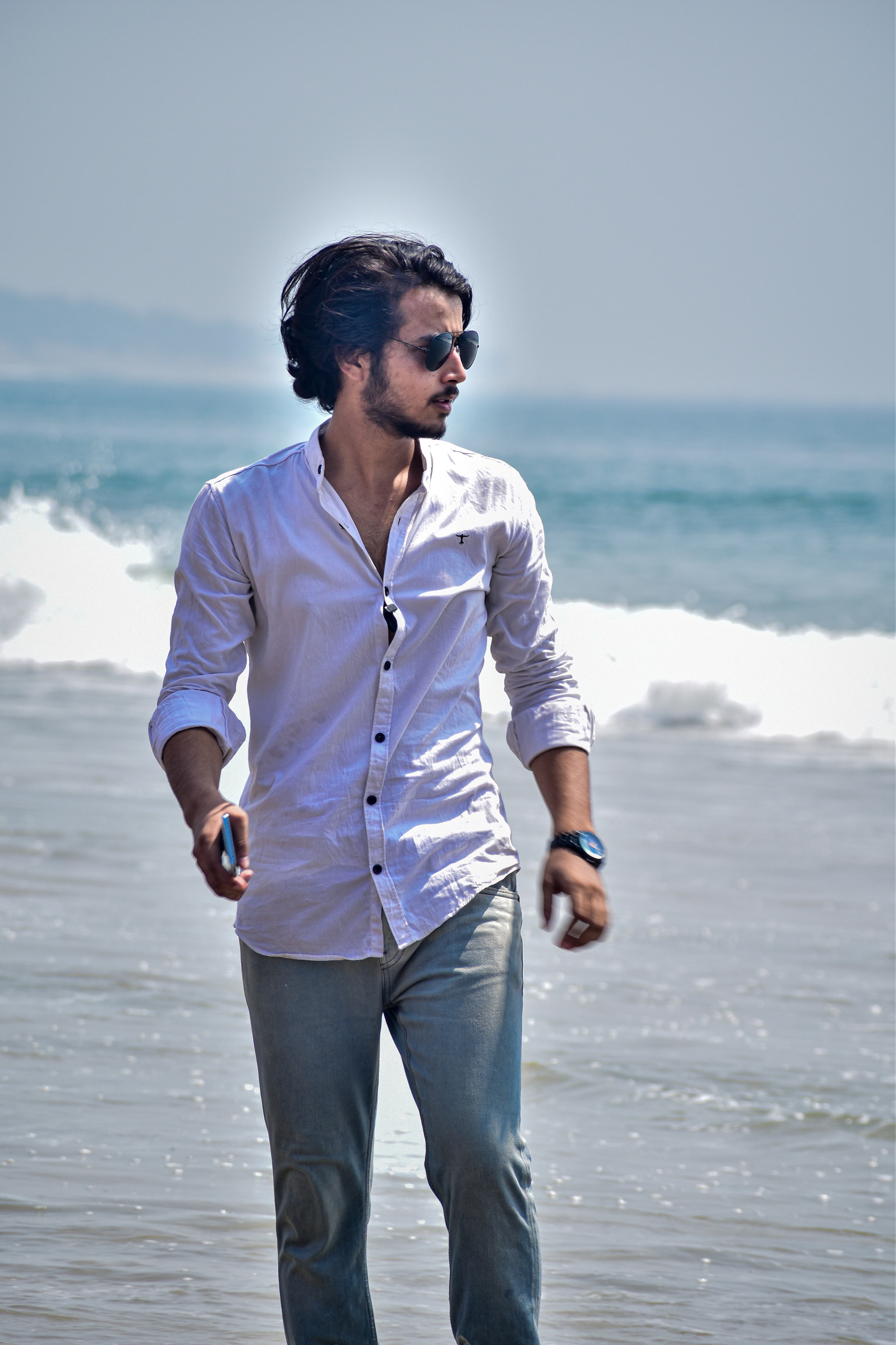 Walking on the beach with waves